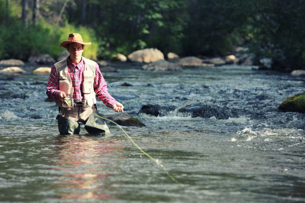 istock Trout fishing 906801108