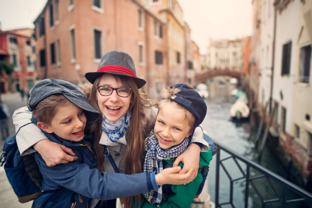 istock Happy Kids sightseeing Venice, Italy 906801640