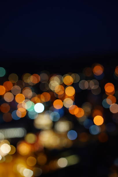 istock Defocused urban abstract texture bokeh city 906808222