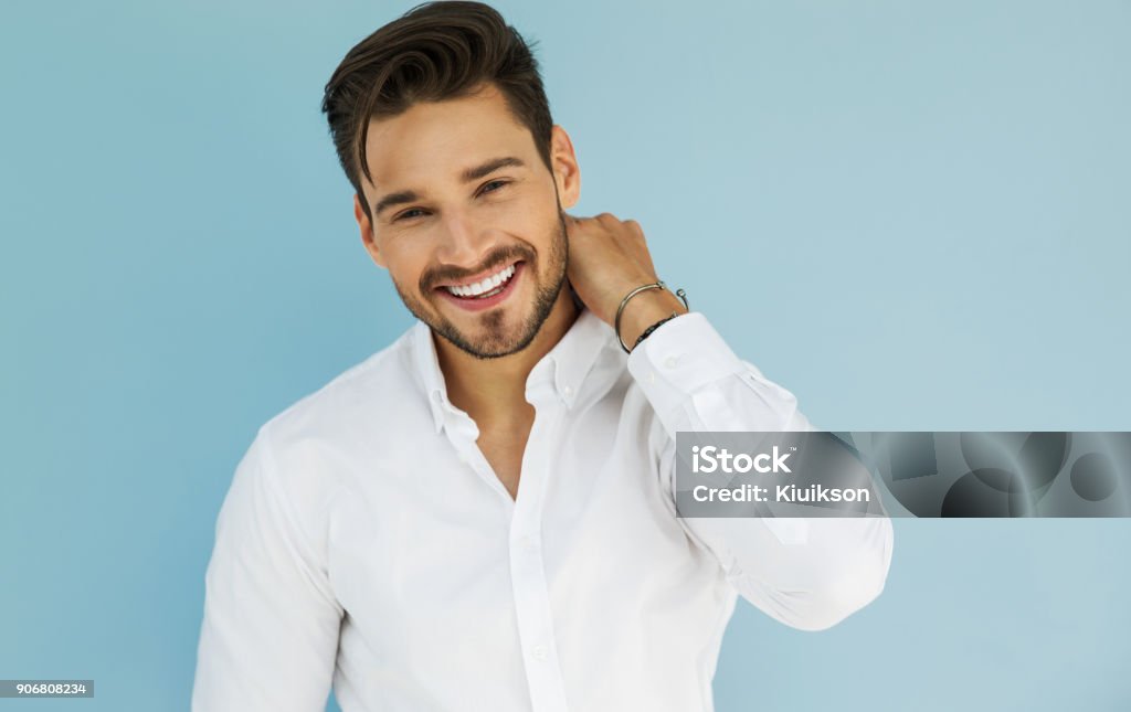 Handsome man Portrait of sexy smiling male model Men Stock Photo