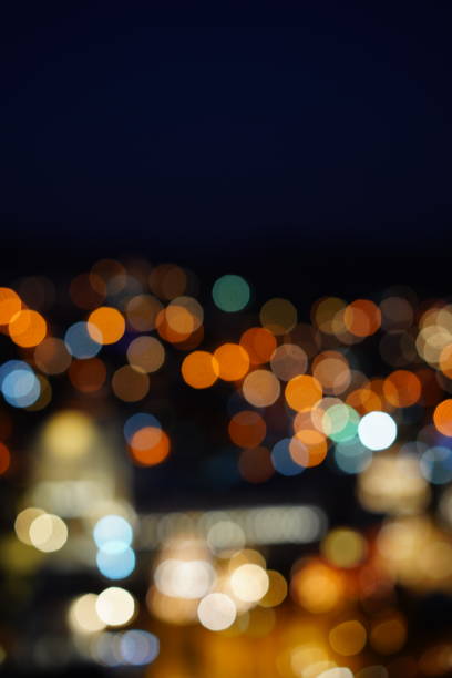 istock Defocused urban abstract texture bokeh city 906812538