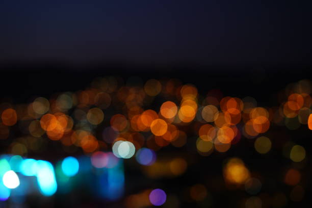 istock Defocused urban abstract texture bokeh city 906813136