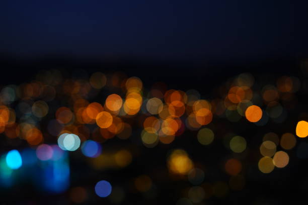 istock Defocused urban abstract texture bokeh city 906813370