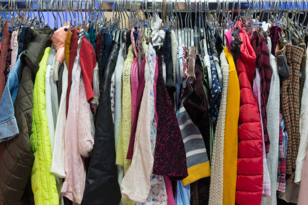 istock Background of different clothes hanging on the hanger 906819560