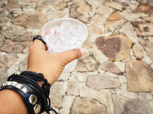 istock Selfie of hand with ice cubes 906819616