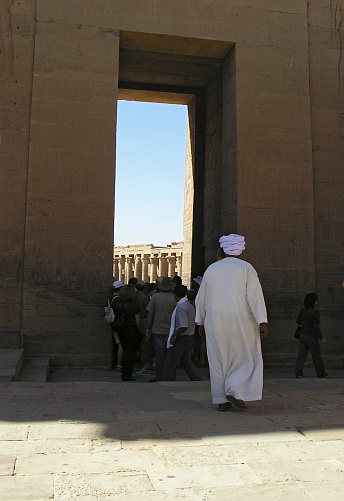 Egyptian wearing a turban visiting  Philae temple, Egypt, Africa