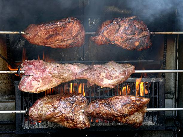 BBQ  smoking meat rotisserie barbecue grill stock pictures, royalty-free photos & images