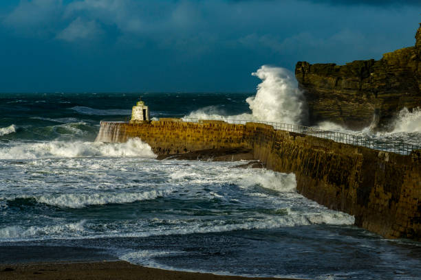 istock Huge Atlantic Swell Clatters into Portreath 906829748