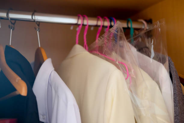 Close up of different male clothes in wardrobe