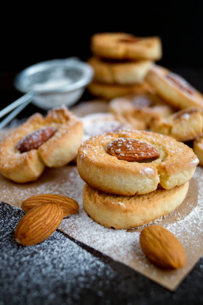istock Homemade cookies with almonds and powdered sugar. 906841036