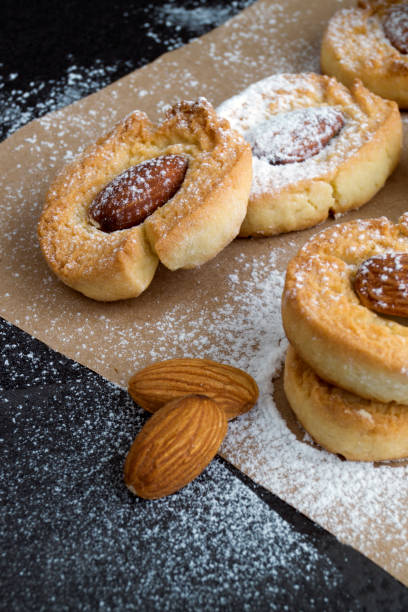 istock Homemade cookies with almonds and powdered sugar. 906841240
