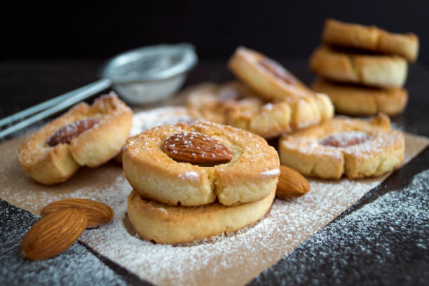 istock Homemade cookies with almonds and powdered sugar. 906842310