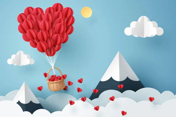 Vector illustration of Paper art of heart balloon flying and scattering little heart in the sky, origami and valentine's day concept
