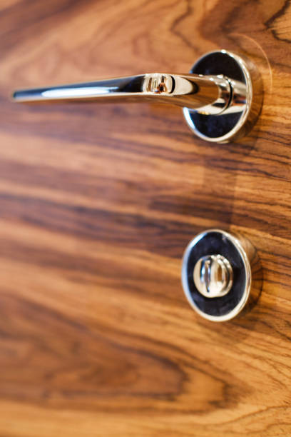 istock interior wooden door with  a handle close 906847044