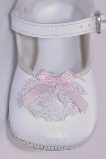 baby girl shoe stock photo