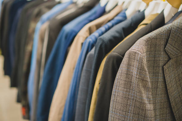 istock Coats and jackets in second hand shop. 906851104