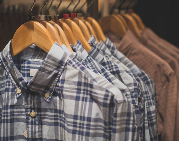 istock Men's shirts in a clothing store. 906851274