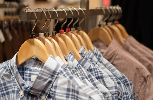 istock Men's shirts in a clothing store. 906851314