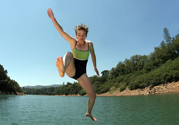 istock Jumping in the lake 90685289