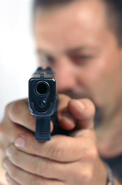 istock Looking into barrel of gun 90685312