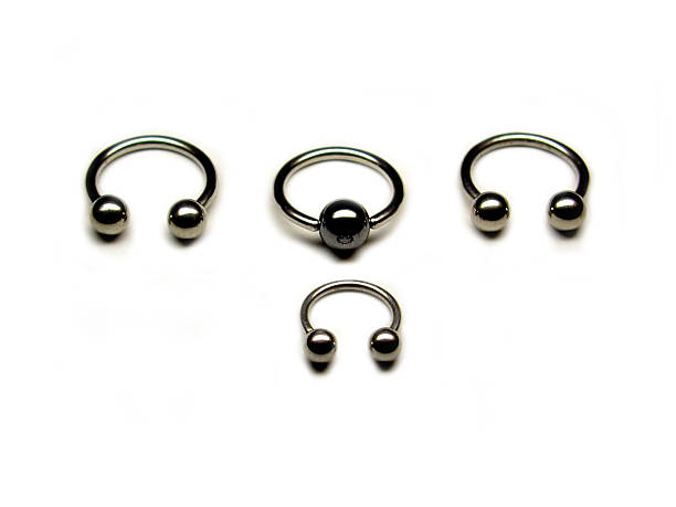 Body Jewelry  septum piercing stock pictures, royalty-free photos & images