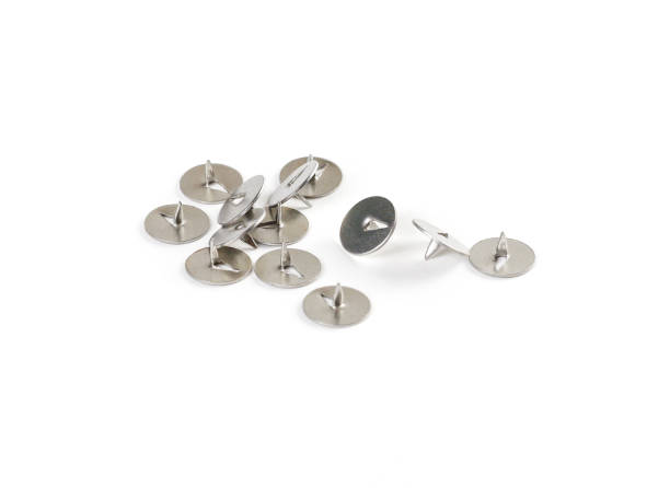 istock Metal pushpin on a white background. Closeup 906857864
