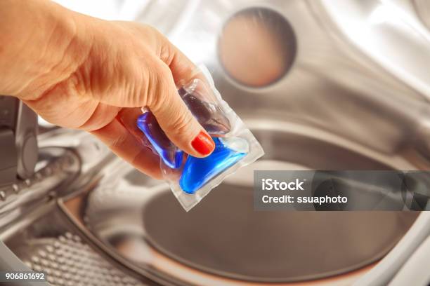 Blue Gel In Hand For Washing Stock Photo - Download Image Now - Pill, Laundry, Washing Machine