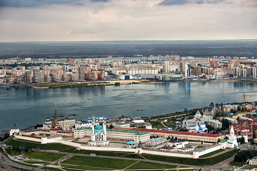 Helicopter point of view of Kazan, capital of Republic of Tatarstan, Russia. Kazan Kremlin and river Kazanka are in main view with Riviera Aquapark in the distance.