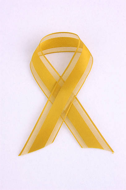 Awareness Ribbon, yellow stock photo