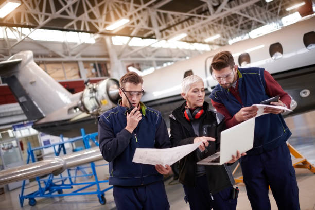 istock Aircraft mechanics in the hangar 906871320