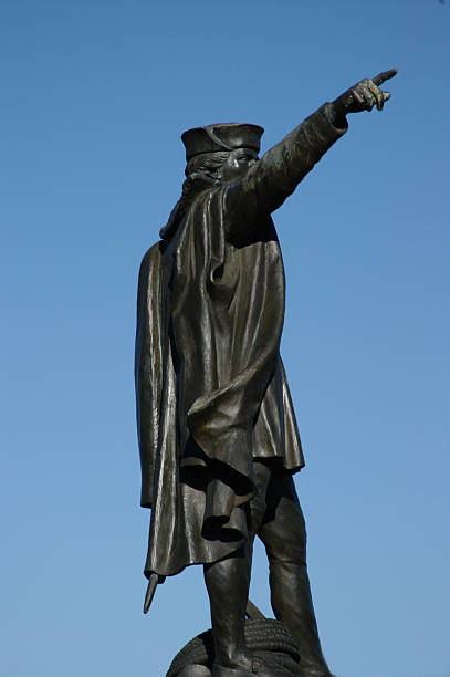 istock Dark gray statue of Christopher Columbus over the blue sky 90687564