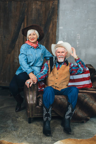 istock elderly couple, cowboy style 906879016
