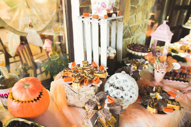 istock Delicious sweets on wedding candy buffet with desserts, cupcakes 906894360
