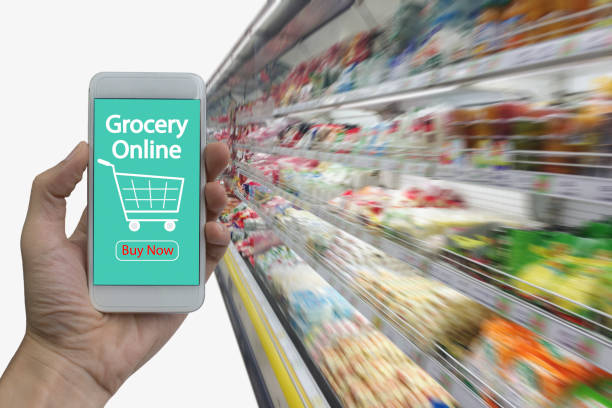 istock Hand use smartphone with grocery online 906894394