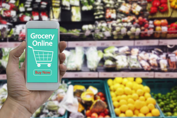 istock Hand use smartphone with grocery online 906894508