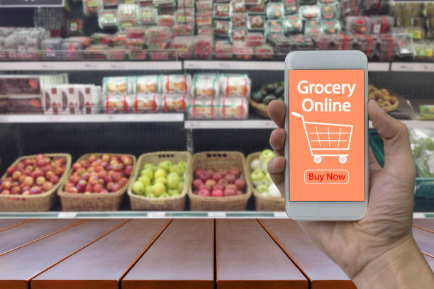 istock Hand use smartphone with grocery online 906894688