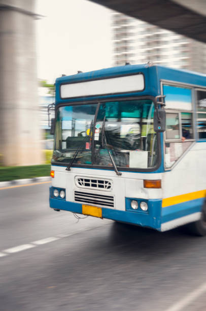 istock Speeding Bus In Bangkok, Thailand 906899206