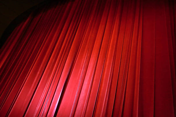 istock Red curtain in cinema 906902916