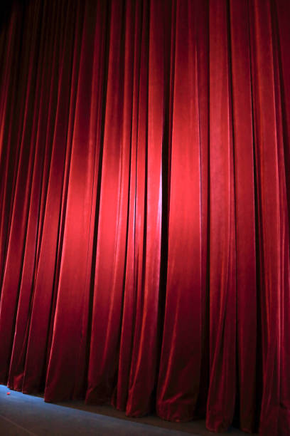istock Red curtain in theater 906903516