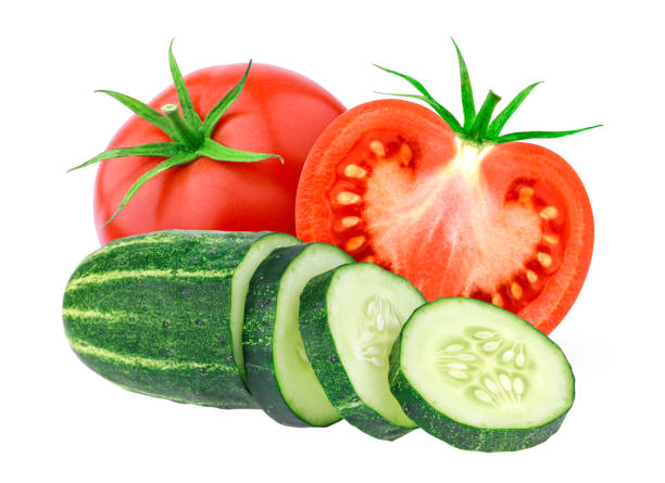 istock Tomato and cucumber isolated on white background 906918722