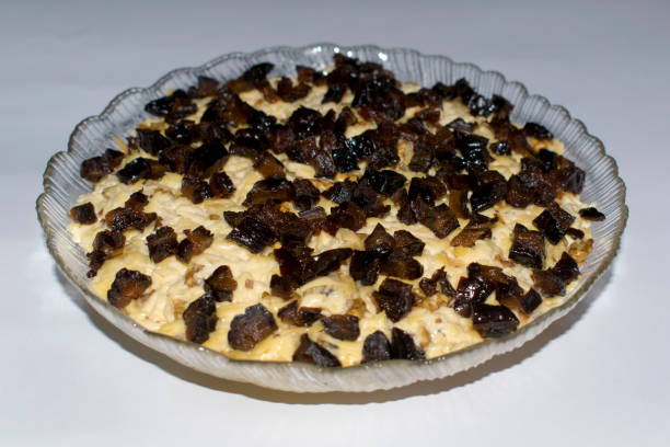 istock Salad with crab sticks, cheese, egg and prunes. 906922134