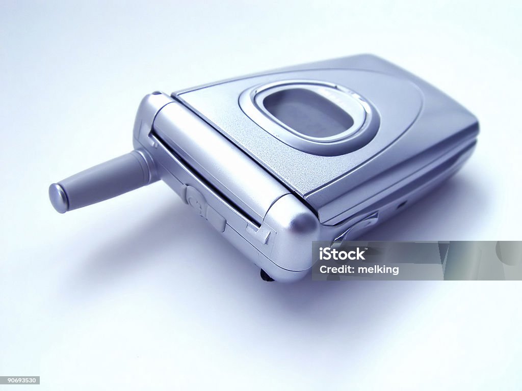 Flip teléfono celular con un matiz de color azul - Foto de stock de Acero libre de derechos