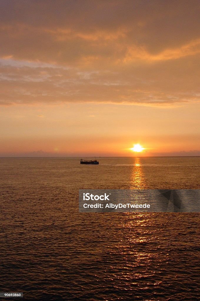 Puesta de sol en el mar en los Países Bajos - Foto de stock de Aire libre libre de derechos