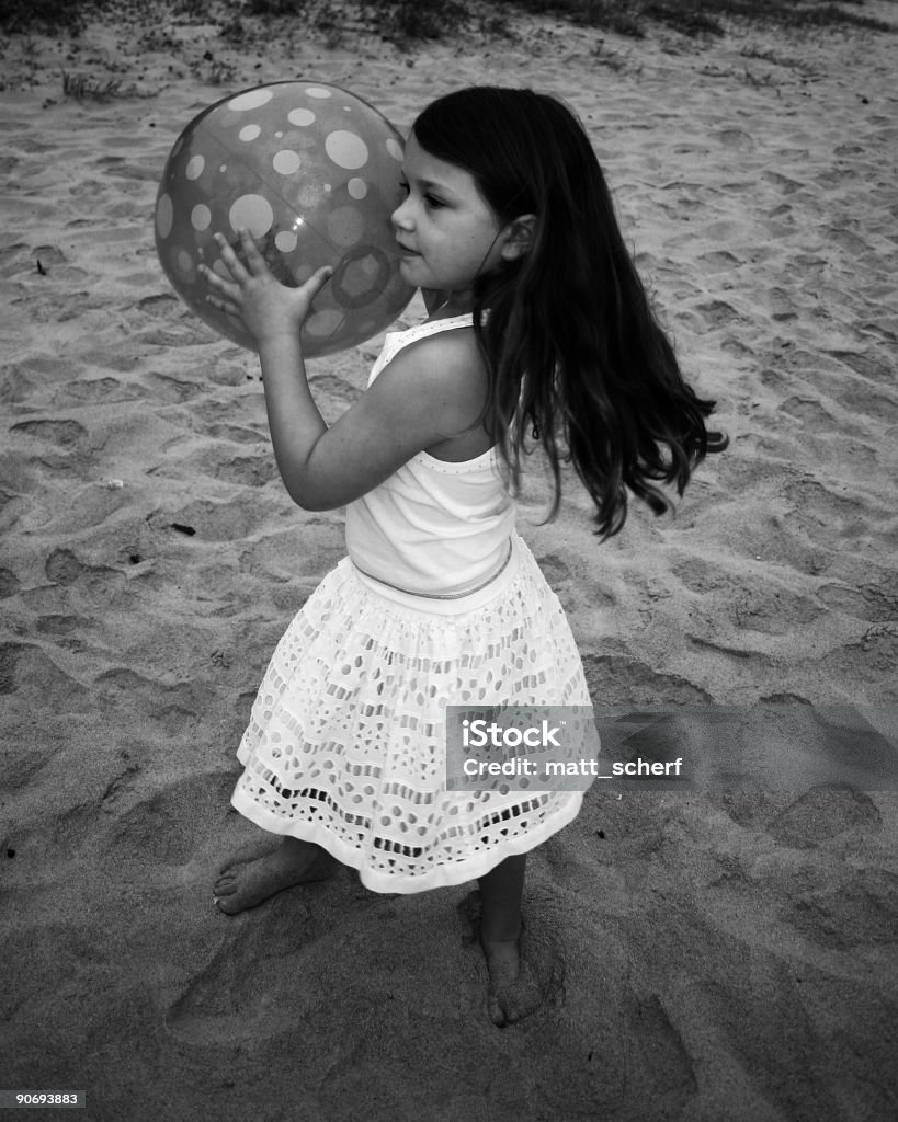 Beach Ball A girl at the beach with a ball  Beach Stock Photo