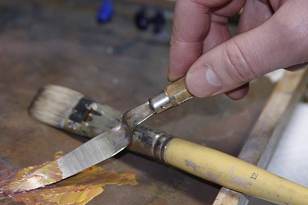 istock Artist's hand and pallet knife 90694422