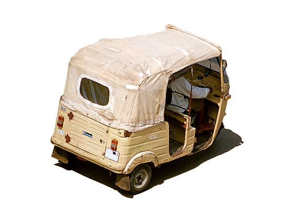A traditional ape taxi on the streets of Sicily, Italy.