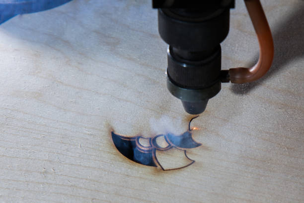 istock The laser cuts out a tree in the form of a mandala 906959482