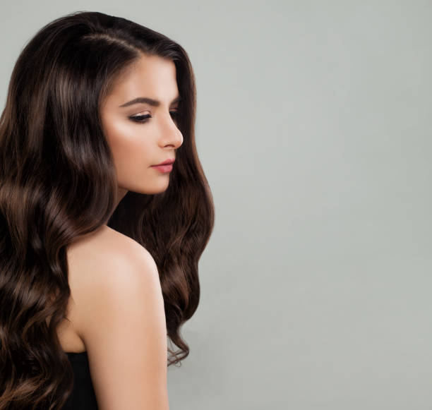 istock Woman in black dress 906962204