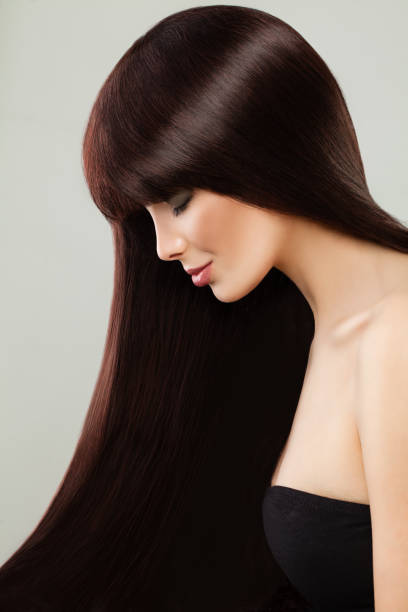 istock Brunette woman in black dress 906962272