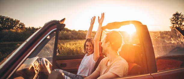 Romantic moments in sunset on a road trip